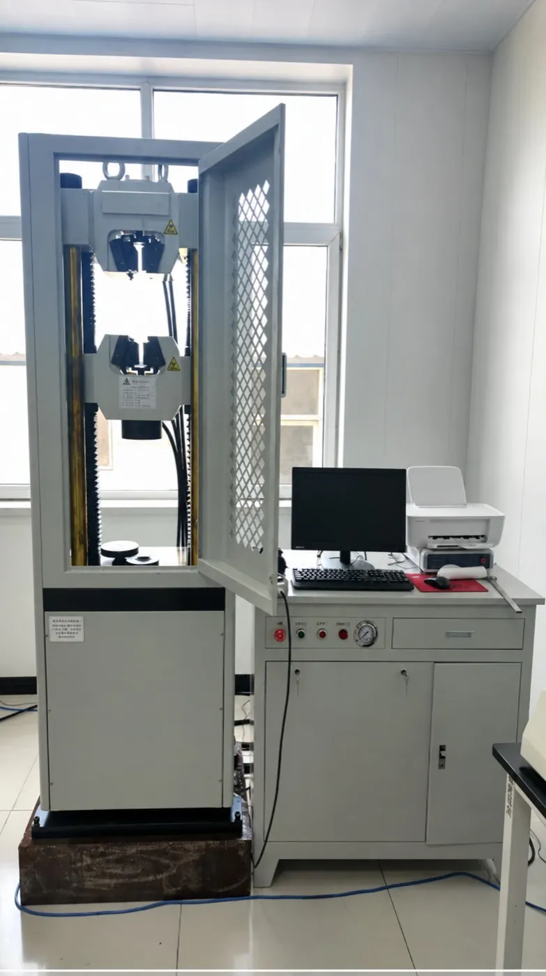 Universal testing machine with two grips and a perforated safety door